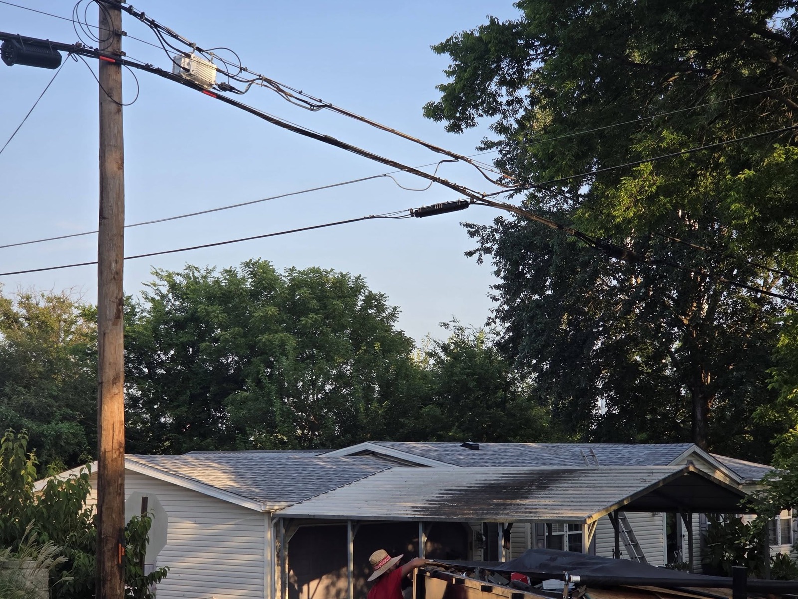 Finished roofline at a job site in the evening light
